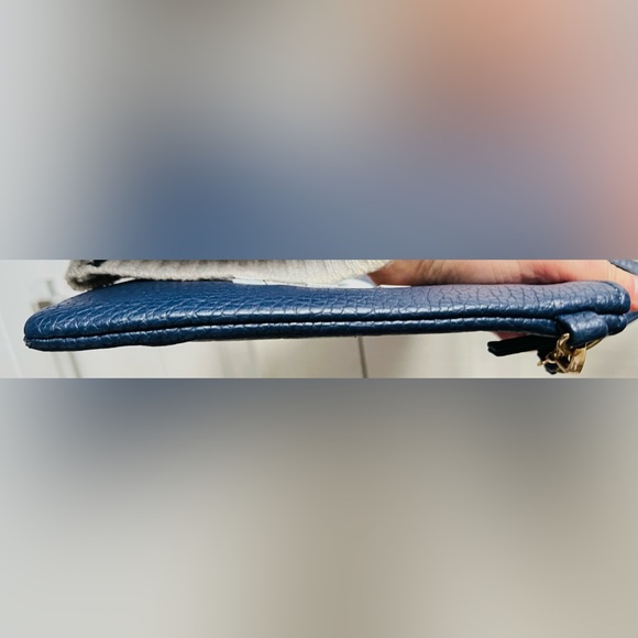 A navy blue shoulder and wristlet, adjustable strap to also wear as a crossbody - Picture 10 of 12